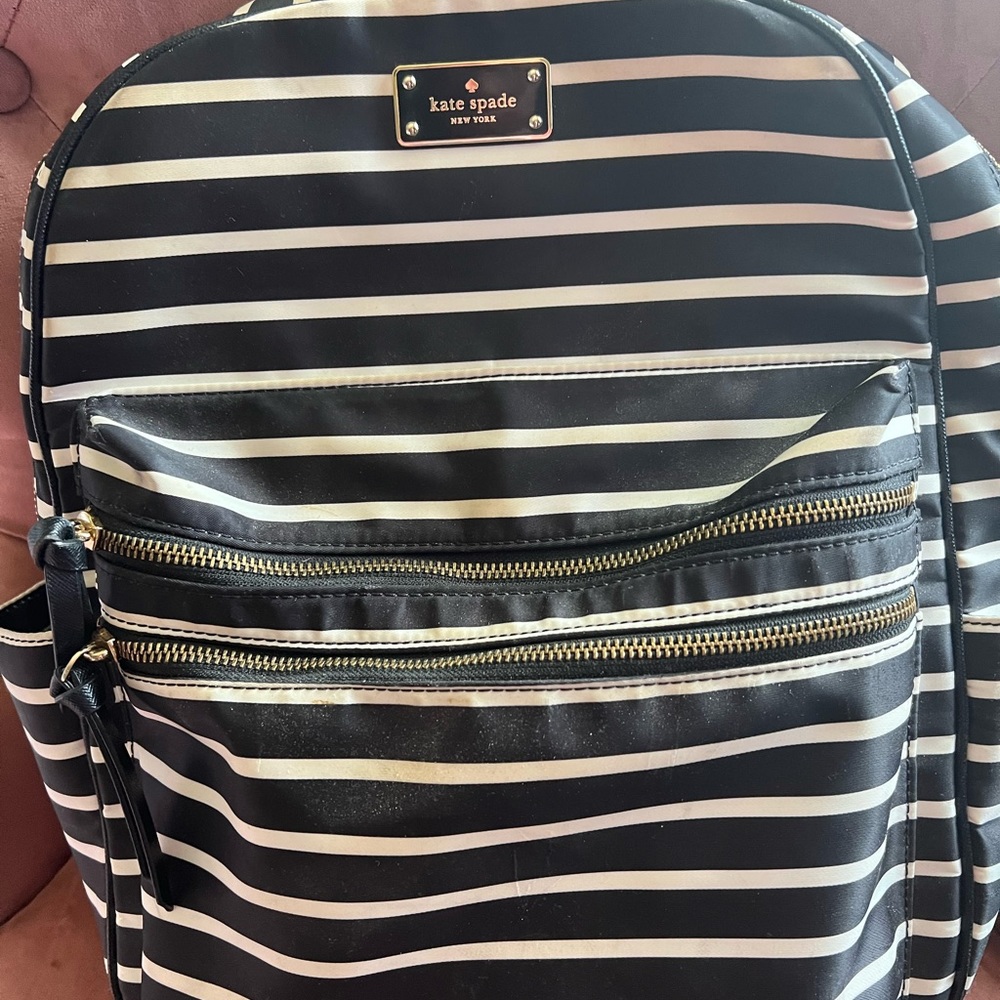 Authentic Kate Spade backpack in black and white stripe. Good condition!